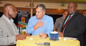 Guyana Consul General To Barbados, Michael Brotherson (right) with Vice-President Carl Greenidge (left), and Barbados’ Honorary Consul to Guyana, Gerry Gouveia, during a reception held in honour of the Guyana Joint Commission delegation to Barbados.   