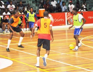 Part of the action in the Banks Beer Inter-Ministry Futsal Competition currently being played, at the Cliff Anderson Sports Hall. 