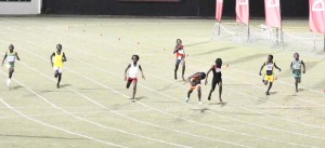 Flashback! West Coast Berbice’s, Jaquan Boyce (lane 4) dips at the finish line with Keifon Jack (on his right) at the National Stadium two years ago in the U-10 Boys 150m Final.