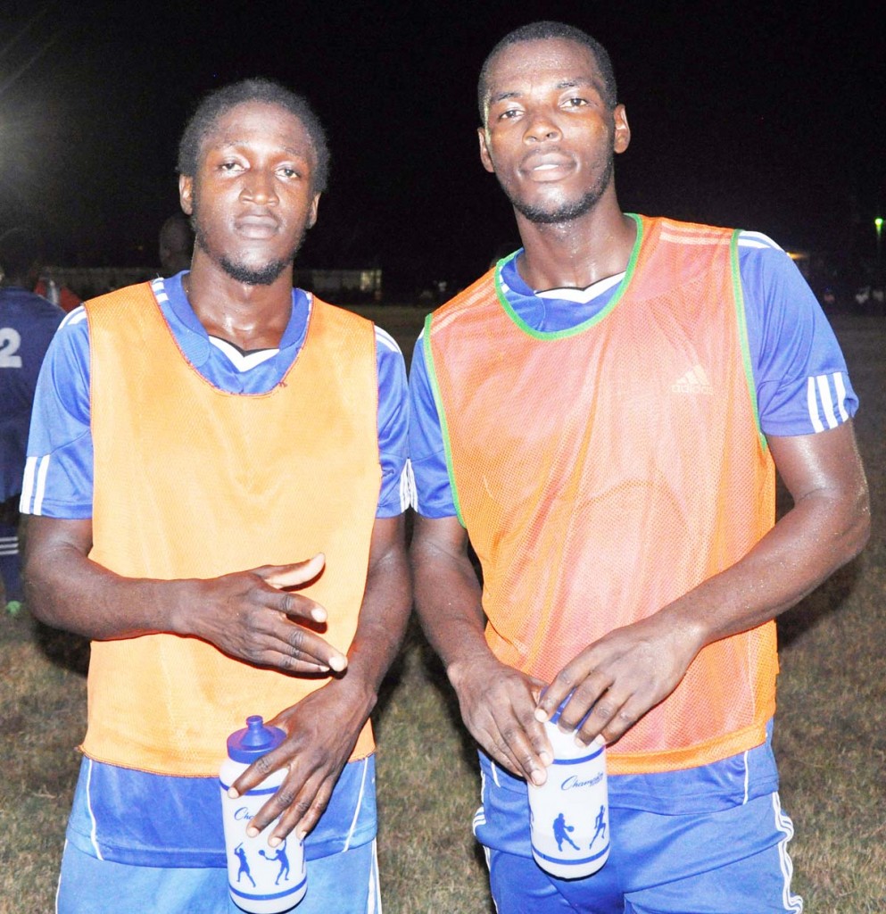 Maxton Adams and Kevon Barry pose for a photo op following their win over New Amsterdam United on Wednesday night at Golden Grove ground
