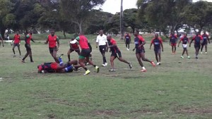  Action in the GTT/GRFU Tens Tournament at the National Park in which UG Wolves whipped Police 65-0.