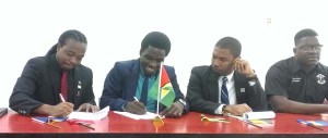 (From left) President of the UWI St Augustine Campus Guild Makasi Peters, UGSS President Joshua Griffith, UWI Cave Hill Campus Guild President Dalano Da Souza and Jordon Jarrette, Law representative of UWI Cave Hill campus yesterday at the signing of the MoU.