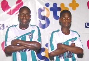 Victoria Kings scorers (from left)- Alden Lawrence and Orwin Bishop pose for a photo op following the completion of their clash against Rosignol United.