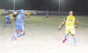  Part of the action on opening night of the GTT Round Robin / Knockout Football Competition at the No.5 ground in West Berbice.