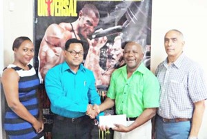 Donald Sinclair (right) Flex Night Managing Director, receives the commitment of sponsorship from Mr. Reginald Persaud, Managing Director of IPA in the presence of Ms. Atisha Isaacs, IPA Marketing Manager and Mr. David Gomes Flex Night Director of External Resources.