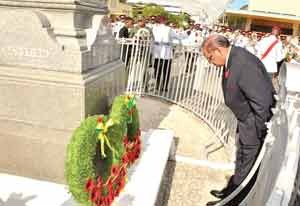 Prime Minister Moses Nagamootoo pays tribute at the War Memorial. 