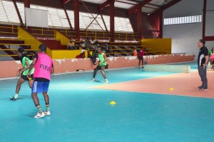 GFF TD Claude Bolton (right) taking the players through the paces at the National Gymnasium. 
