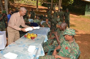 Service with a smile! President David Granger serves Christmas Lunch at Location Eteringbang.