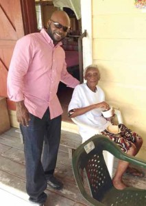 President Tyrone Anthony with a resident of the home