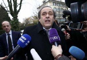 UEFA President Michel Platini speaks to media as he arrives with his counsel Thomas Clay (L) for a hearing at the Court of Arbitration for Sport (CAS) in Lausanne, Switzerland December 8, 2015. (Reuters/Denis Balibouse)