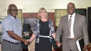 Back in September, at the announcement of the law review; from left Winston Felix, Minister of Citizenship; UNICEF country representative Marianne Flach and Patrick Triumph, CEO of Triumph International Group.
