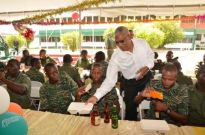 President Granger serving lunch at Base Camp Stephenson on Thursday.