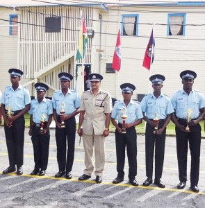  Commissioner of Police: Seelall Persaud D.S.M at center stands with the most outstanding ranks out of the police recruit courses # 329 and 330