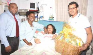 Mom Camanie Kishon, nurse Omodelle Samuel and  Ansa Mcal Brand Reps Joel Lee  (left) and Leon FitzPatrick 