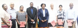 From Left: Claudette Rogers; Chairman of the Board, Shabir Hussein; Mandy Sukhdeo; Minister of Public Infrastructure, David Patterson; Minister within the Ministry, Annette Ferguson; Joseph Holder; Rafeza Hussein and Ex-Officio Member, Rawlston Adams. 