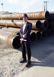 Minister Dominic Gaskin after a preliminary tour of the onshore materials holding area at the Wieting Richter Ltd wharf, leased by John Fernandes, on Water Street.