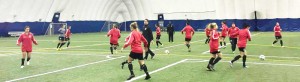 Head Coach Mark Rodrigues taking the Lady Jags through training during their camp in Toronto Canada. Photo Name: Jags Training