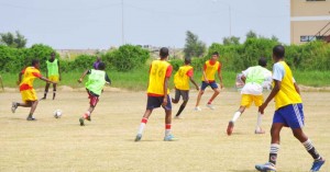 Action in the clash that featured Richard Ishmael and Carmel Secondary yesterday at the Ministry of Education ground.