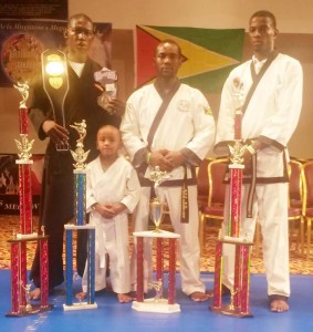 Team Torres Martial Arts Guyana display their silverware in New Jersey.