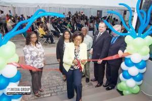 Telecommunications Minister Cathy Hughes cuts the ribbon to commission Teleperformance