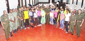 The athletes with the Chief Of Staff (at centre) and other senior GDF officers.