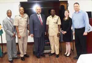 From Left – U.S. Embassy INL Coordinator Leon Carr III; Guyana Police Force Commissioner Seelall Persaud; U.S. Ambassador Perry L. Holloway; Guyana Police Force Training Officer Paul Williams; MetroStar Systems Programme Managers, Christine Allgood, and Shai Segall.