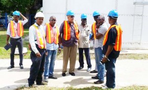 GWI CEO Dr. Richard Van West-Charles inspecting upgrades at the Bartica Water treatment facility in the presence of GWI senior engineers and management.