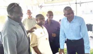 President David Granger (RIGHT) engages Kaieteur News Editor- in-Chief Adam Harris (LEFT) in the presence of Minister of Foreign Affairs Carl Greenidge and Director of Communications Mark Archer.