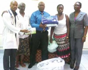 (From left) Dr. Carr, Catherine Archer, Colin Bynoe, Wanetta Phillips and Matron Paul during last week’s donation at the New Amsterdam Hospital