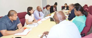 Minister of Natural Resources, Raphael Trotman, briefing the new members of the Guyana Gold Board (GGB) at the Ministry’s boardroom yesterday.