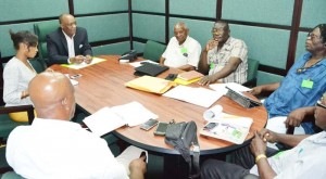 Minister Joseph Harmon (at left) meeting with the GCAG executives 