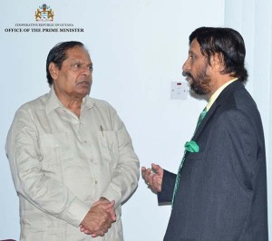 PM Moses Nagamootoo and Iwokrama Chairman Dr Rajendra Pachauri in discussion.