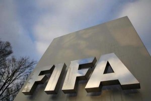 A FIFA sign is seen outside the FIFA headquarters in Zurich, Switzerland December 17, 2015. (Reuters/Ruben Sprich)