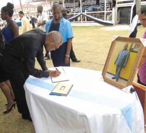 President David Granger, as he signed the Book of Condolences 