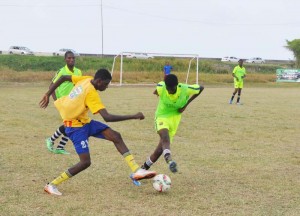 Part of the action in the clash between Bishop’s High School and Central High yesterday.