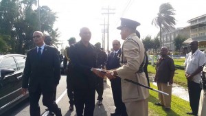 President Granger is greeted by the Commissioner of Police Seelall Persaud on his arrival at Eve Leary. 