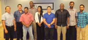 Newly elected Board of Directors pose with the Permanent Secretary Ministry of Education, Department of CY&S, Mr. Alfred King (4th left); From left: Mr. Nicholas Hing, Mr. Gerard Mekdeci, Mr. Mohamed Khan, Ms. Vidushi Persaud, Mr. Peter Hugh, Mr. Steve Ninvalle, Mr. Ryan McKinnon and Mr. Jagmohan Bassoo.