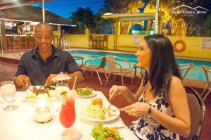 Grand Coastal’s outdoor courtyard provides the perfect setting to relax for dinner.