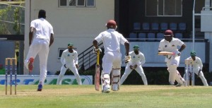Jerlani Robinson gathers runs during his half-century in St Lucia yesterday.
