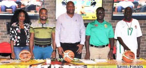 GABF President, Nigel Hinds (centre) pose for a photo opportunity with stakeholders following the launch of the 2016 National Basketball Championships, which bounces off on Friday, March 4 at the Cliff Anderson Sports Hall.