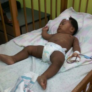 10-month old, Omar Jones, at the GPHC Pediatrics Ward yesterday.