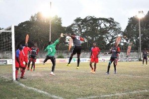 Alpha United’s Anthony Abrams’ (#10) header eluded Monedderlust goalie Elvis Rutherford but was cleared off the line by a defender, 2nd left. 