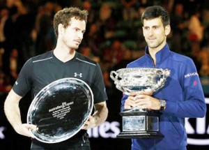Serbia’s Novak Djokovic (R) stands with the men’s singles trophy beside Britain’s Andy Murray after winning their final match.  (Reuters/Tyrone Siu)