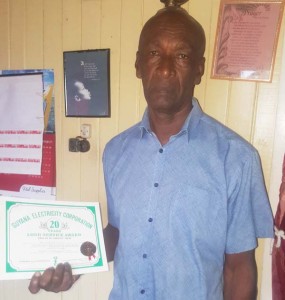 Richard Bourne Veteran lineman Bourne displays a ‘Long Service Award’ from the then Guyana Electricity Corporation