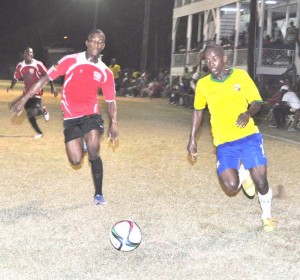 This Pele FC player at right eases into the Buxton defensive third being pursued.