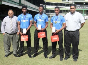 West Indies U19 World Cup winners, second from left Keemo Paul, Captain Shimron Hetmyer and Tevin Imlach along with GCB president Drubahadur at left and Treasurer Anand Kaladeen at Bourda yesterday.