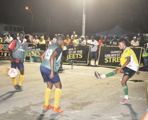Part of the action in the West Side Guinness ‘Greatest of the Streets’ Futsal Competition being played at the Pouderoyen Tarmac.