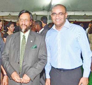 Dr. Rajendra Pachauri (left) with former President Bharrat Jagdeo in February 2012.