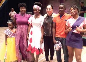 Winners row: Junior Calypso Monarch T’Shanna Cort, 2nd place finisher Niossi Alsopp, Calypso Convener Patricia Chase Green, 3rd place winner William Plowell and Best Newcomer  Dominique Haywood.