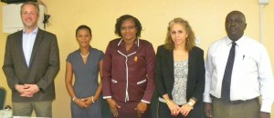  Minister within the Ministry of Public Infrastructure, Annette Ferguson (centre) with (from left) Arran De Moubray, Technical Project Coordinator, CARIBSAVE; Judi Clarke, Caribbean Regional Director, CARIBSAVE; Sophie Makonnen, IDB Representative; and Horace Williams, CEO of the Hinterland Electrification Company Inc. 